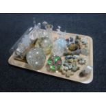 A tray of Wade whimsies, glass ship in bottle,