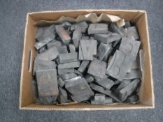 A box of antique wooden printer's letters