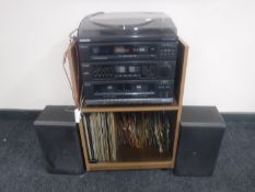 A Samsung hi/fi system on stand with speakers, quantity of L P records and 45 singles - Elvis,