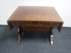 An antique continental inlaid mahogany flap-sided sofa table