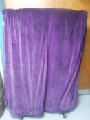 A purple velvet theatre curtain