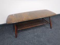 An Ercol coffee table with undershelf