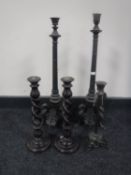A pair of antique cast bronze column candlesticks, height 55.
