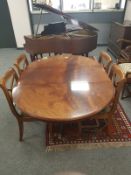 A reproduction mahogany extending dining table with leaf, length 155cm,