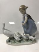 A Lladro figure of a girl with geese (1987),