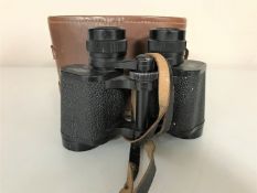 A set of vintage Carl Zeiss 8x30 binoculars in leather case