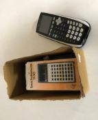 A box of three Texas Instrument calculators together with two further Sharp calculators