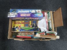 A box containing vintage and later board games including Monopoly Gateshead and Newcastle Edition,