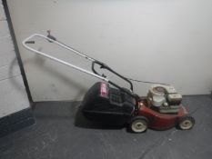 A Mountfield Briggs and Stratton 3 horsepower petrol lawn mower