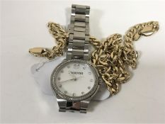 A lady's Swarovski wristwatch together with a gilt chain