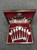 A walnut canteen of Community plated cutlery