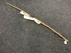 A mid twentieth century archery bow with carry bag