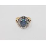 An 18ct gold triplet opal and diamond cluster ring,