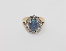 An 18ct gold triplet opal and diamond cluster ring,