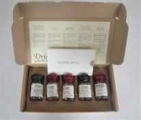 A boxed set of five whisky drams together with tasting notes