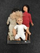 A box of four mid twentieth century plastic headed dolls