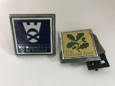 Two National Trust car badges