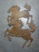 Two cast iron cut-outs of galloping horses
