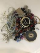 A collection of costume jewellery, compact, dress ring, wristwatch etc.