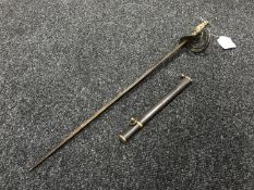 An antique brass handled short sword in part scabbard