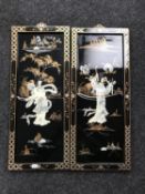 A pair of Japanese black lacquered mother of pearl panels depicting Geisha