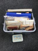 A box of mixed ephemera, manuals, maps, theatre programme,