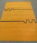 A hand-knotted rug on yellow ground,