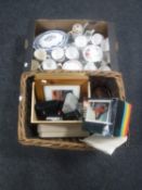 A wicker log basket containing prints, bread bin, assorted cameras, further box of assorted china,