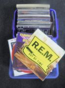 Two boxes of LP records, mainly pop and rock, REM, The Beatles,