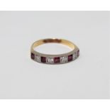 A diamond and ruby half eternity ring,