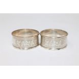 A pair of silver napkin rings.