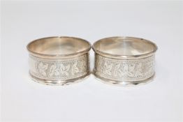 A pair of silver napkin rings.