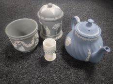 A Wedgwood Jasperware teapot and a planter,