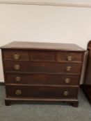 A George III mahogany chest of six drawers on bracket feet,
