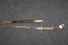 A George V naval officer's dirk in brass and leather scabbard with shagreen hilt