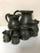 A set of seven antique pewter tankards