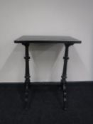 A Victorian ebonised occasional table