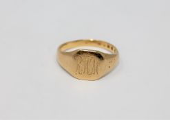 An 18ct gold signet ring CONDITION REPORT: Shank slightly misshapen. 6.7g.
