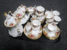 A tray of thirty-three pieces of Royal Albert Old Country Roses tea china and hand bell (34)