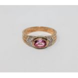 A 9ct gold pink topaz and diamond ring,