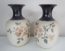 A pair of Royal Doulton glazed pottery vases,