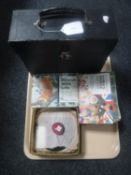 A quantity of tea card albums with cards, case of 78's and 45's singles.