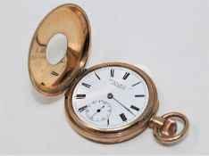 A gold plated half hunter gentleman's pocket watch.