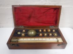 An antique mahogany Sikes Hydrometer by L. Oertling.