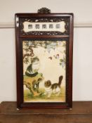 A Chinese painted porcelain panel depicting cats in a garden, in hardwood frame, 73 cm x 43 cm.