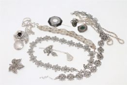 A good collection of silver and white metal jewellery, marcasite, filigree bracelet etc.