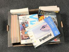 A box containing computer books and magazines together with a boxed Serif graphics pad