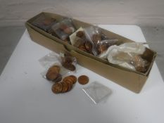 A box containing a quantity of British copper coins (Q)