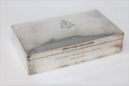 A large Edwardian silver cigarette box of Boer War interest, awarded to Lt. A. G.