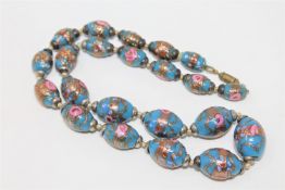 An Edwardian blue glass beaded necklace,